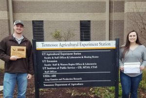 Dawson Kerns and Shelly Pate standing near Tennessee Agricultural Experiment Station